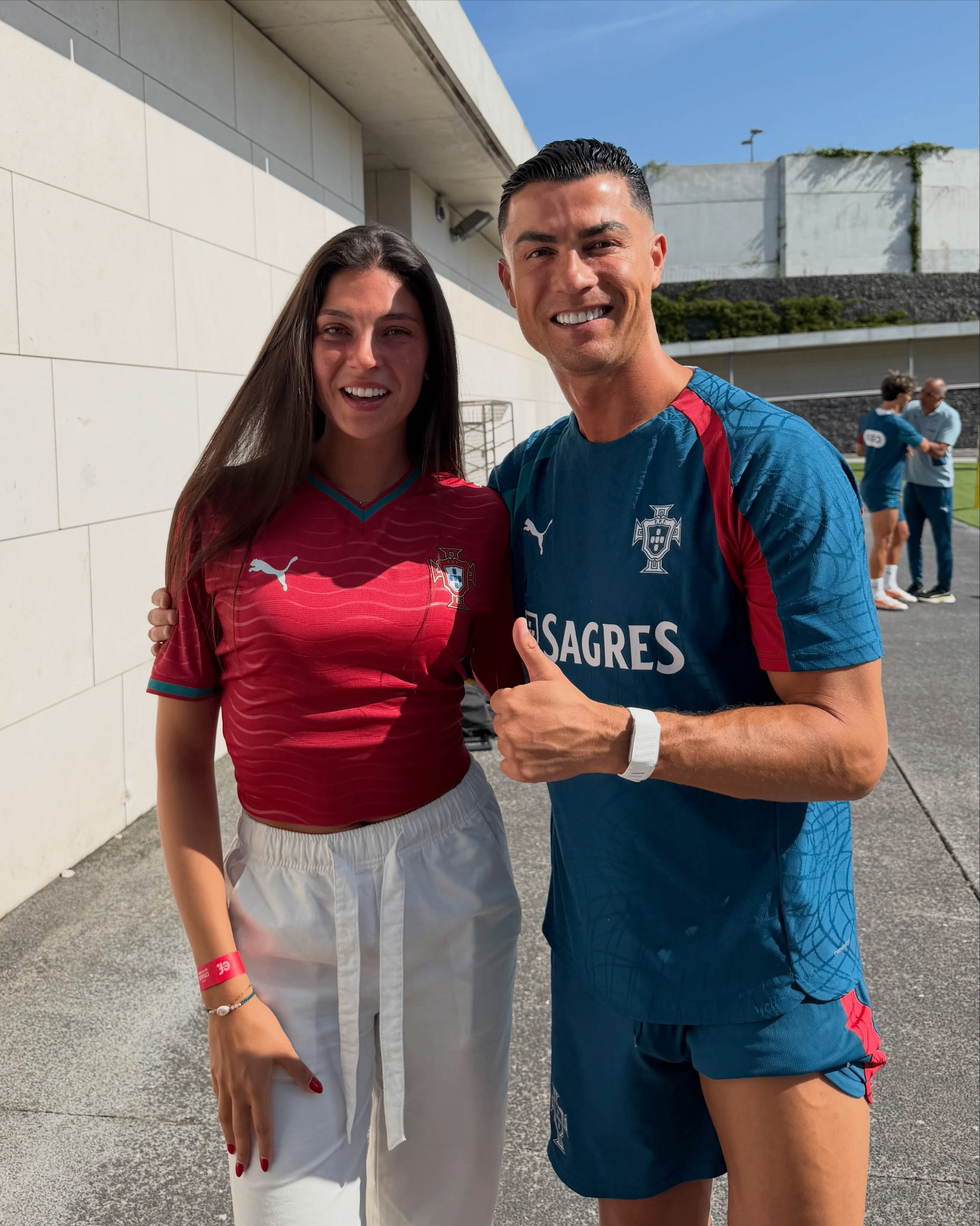 Céline Dept with Cristiano Ronaldo at the Portugal national team training ground