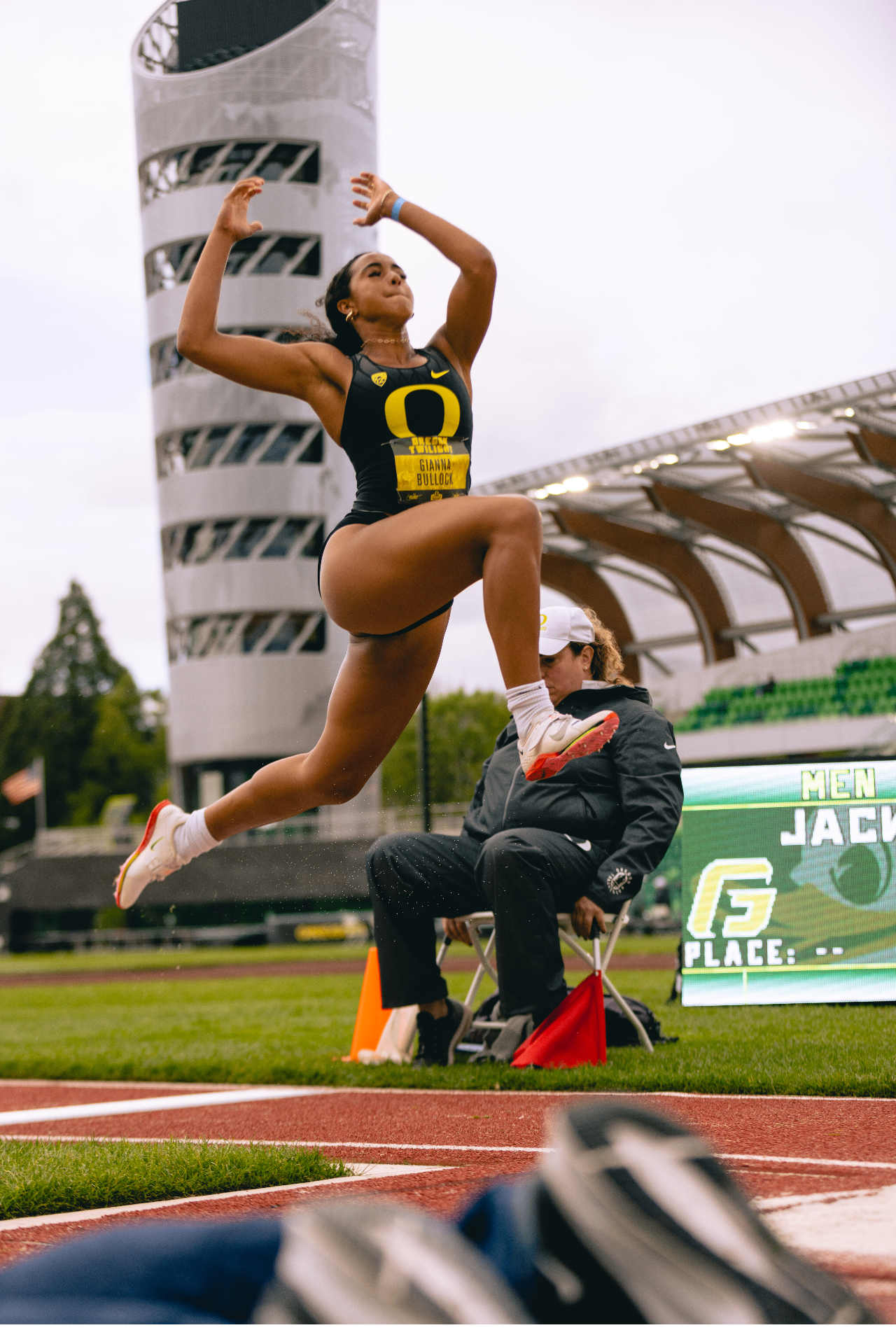 Gianna Bullock in mid-air during competition