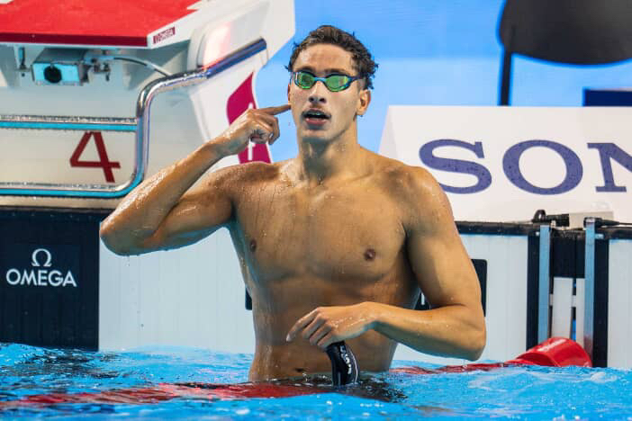 Ahmed Jaouadi pointing to his head after winning