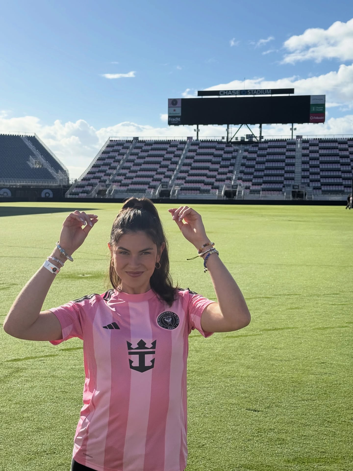 Céline Dept on the pitch at Chase Stadium in an Inter Miami pink kit