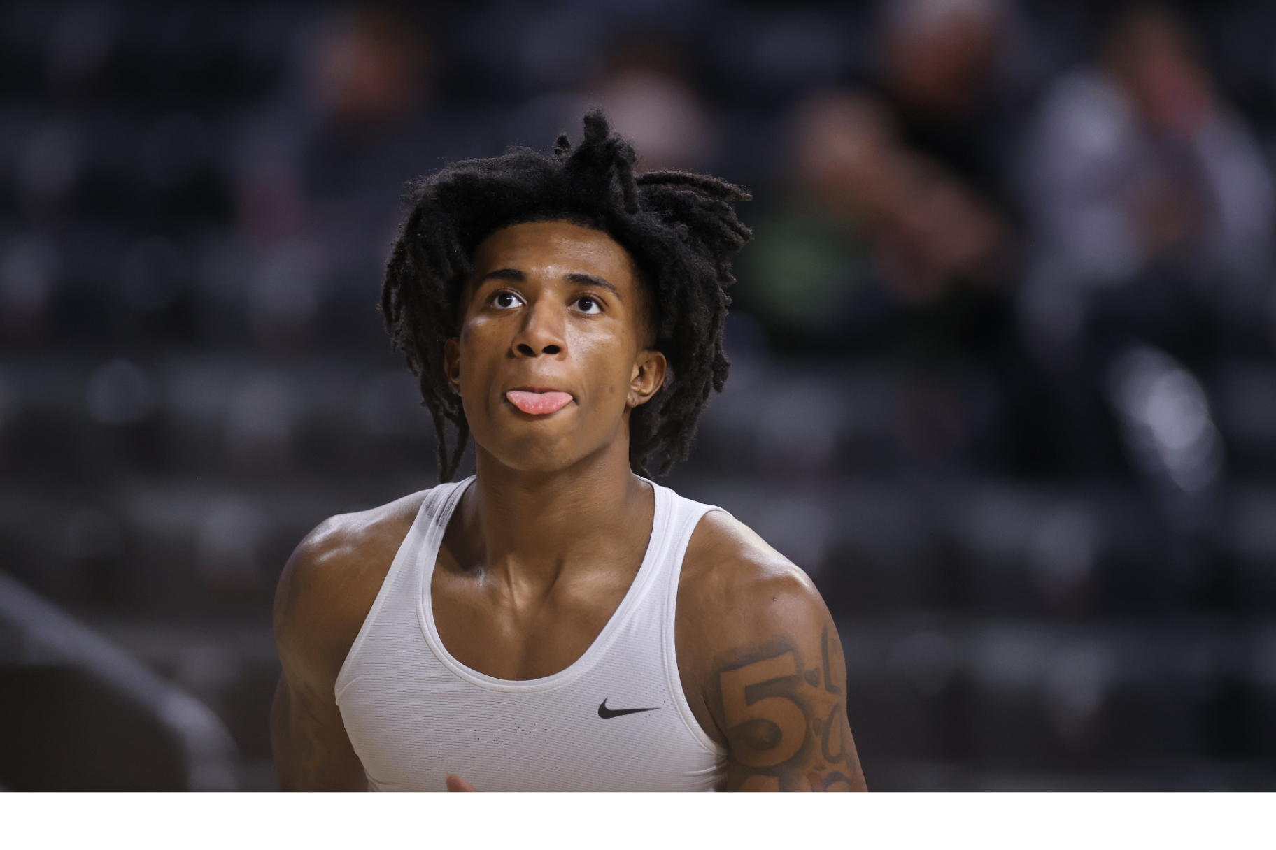 Rayvon Griffith close up in white training top during warmups