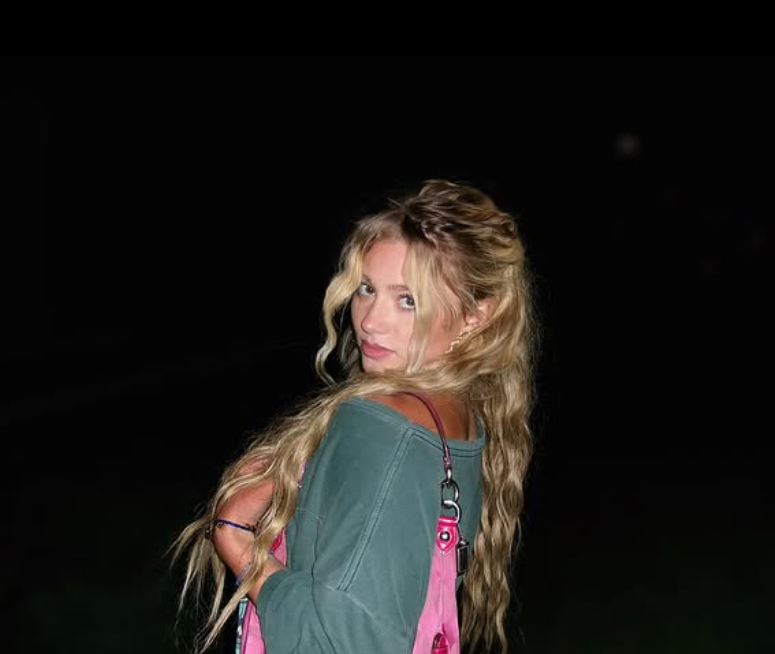 Gianna at night with pink bag