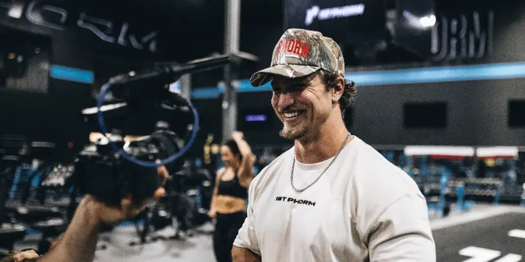 Austin Keil filming in a 1st Phorm cap and tee