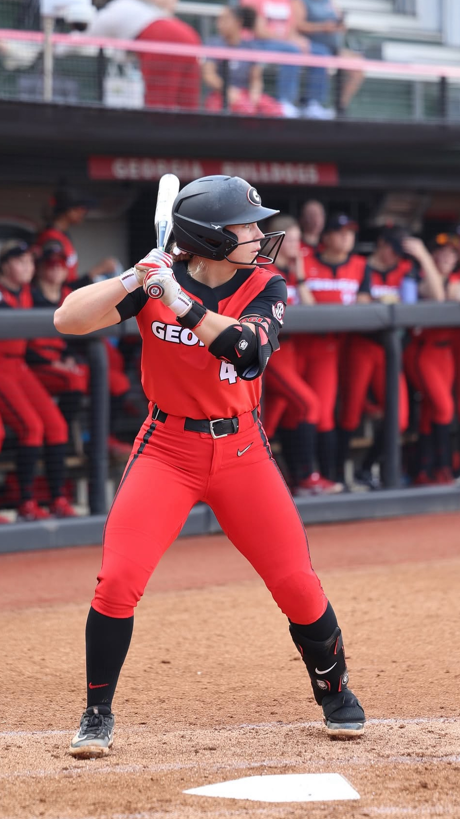 Keirstin in a red Georgia jersey at the plate during a home game