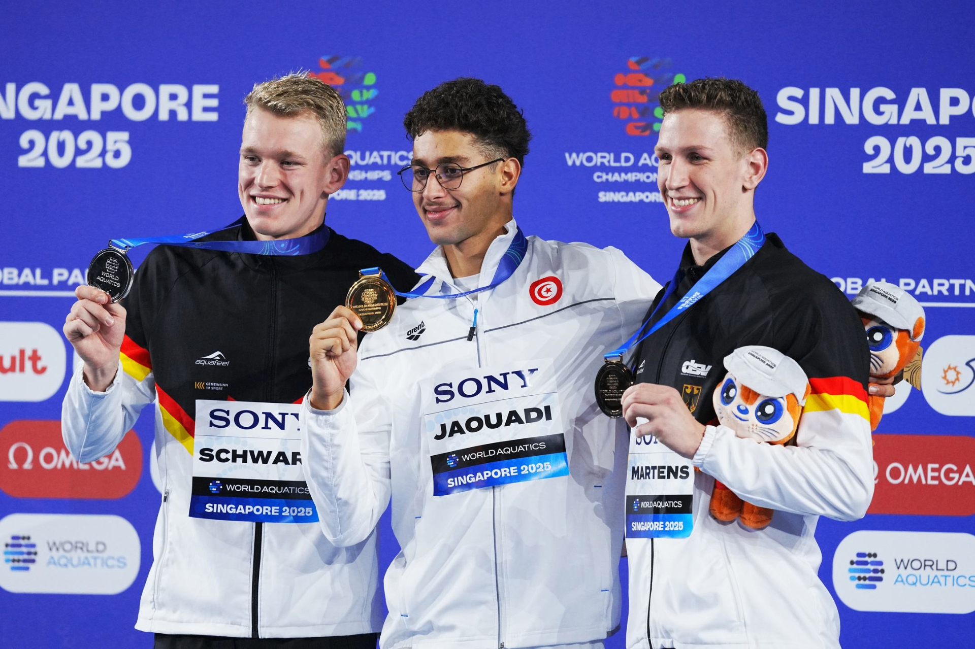 Ahmed Jaouadi on the World Aquatics podium