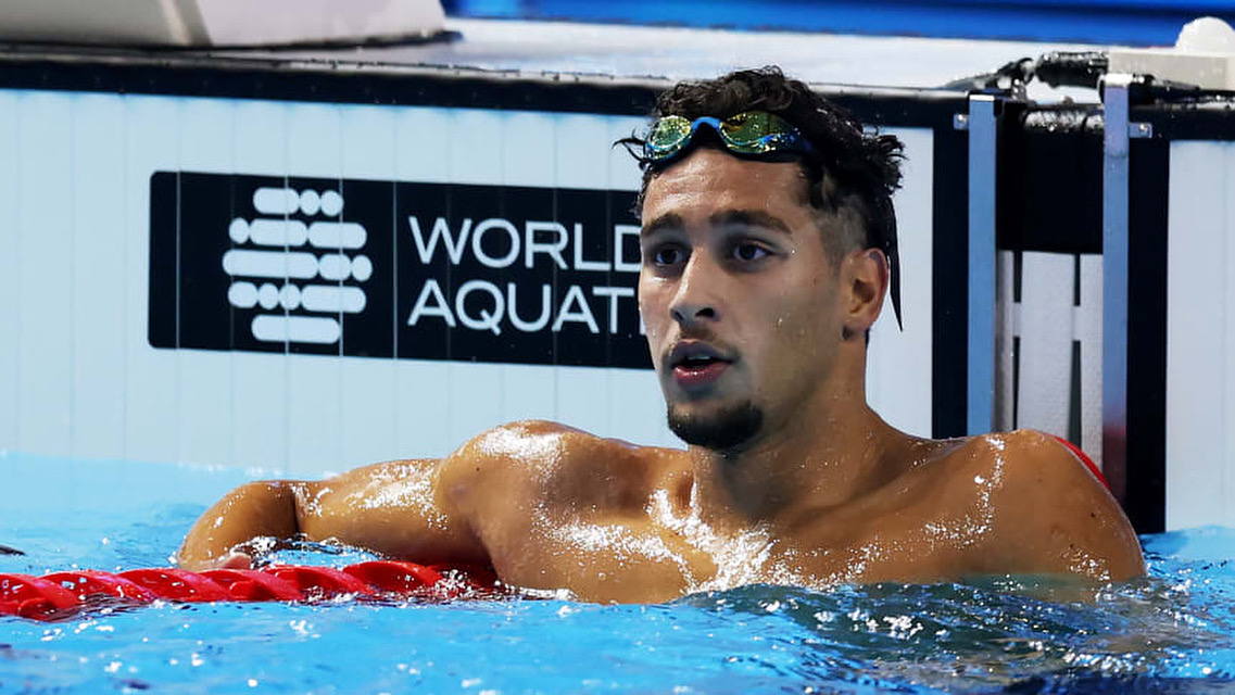 Ahmed Jaouadi at the wall after a swim