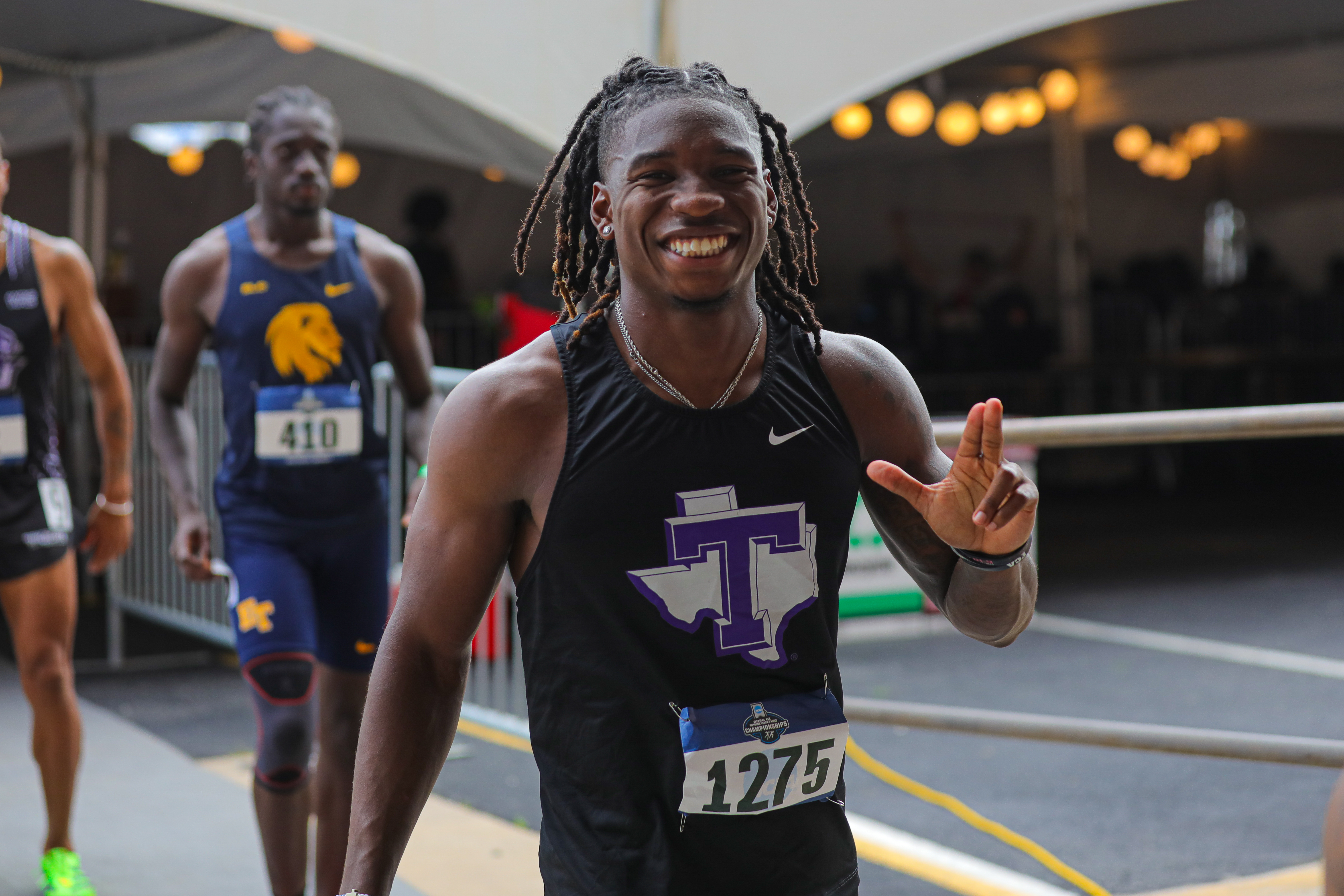 Ca'Terrin Cox smiling after a race in a black Tarleton State singlet