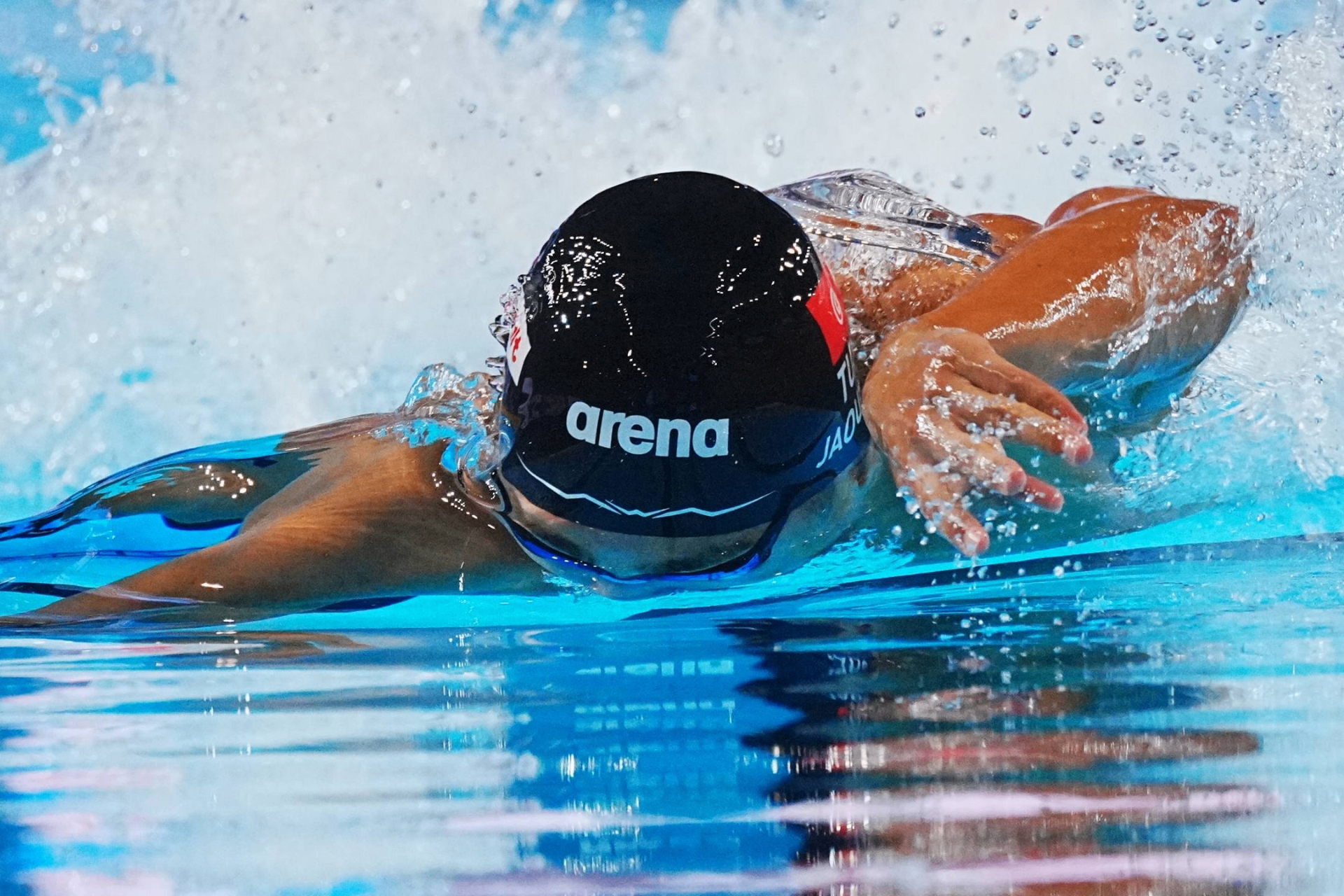 Ahmed Jaouadi mid stroke in the pool