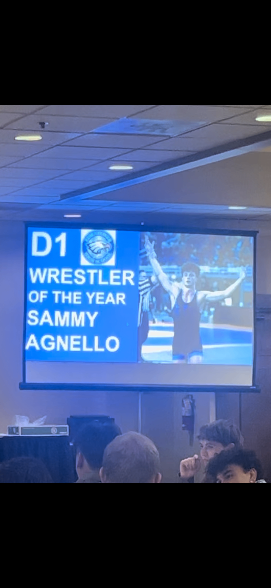 Sammy Agnello named D1 Wrestler of the Year on a projector screen