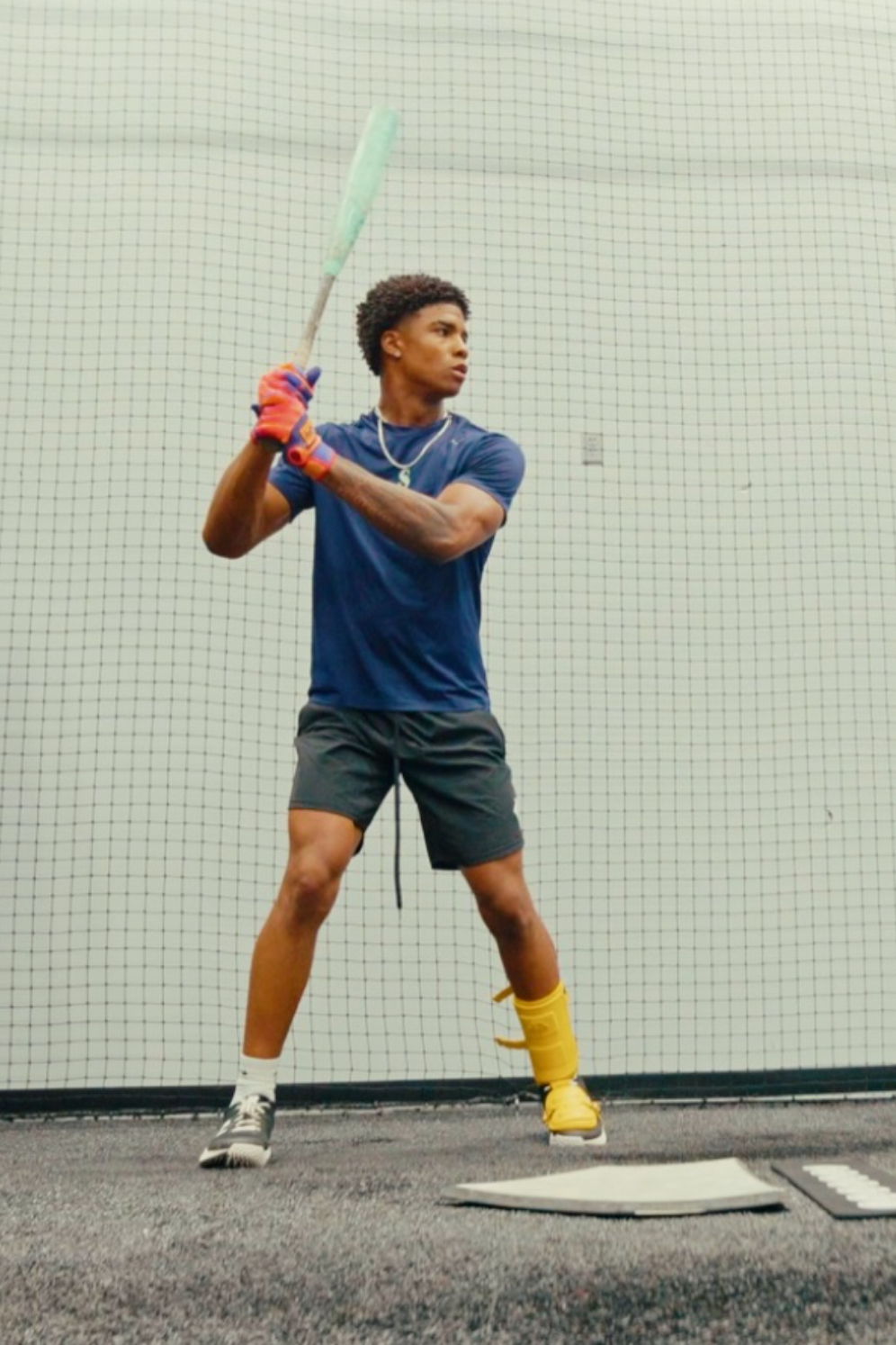 Isaiah Nolan in batting stance during indoor training